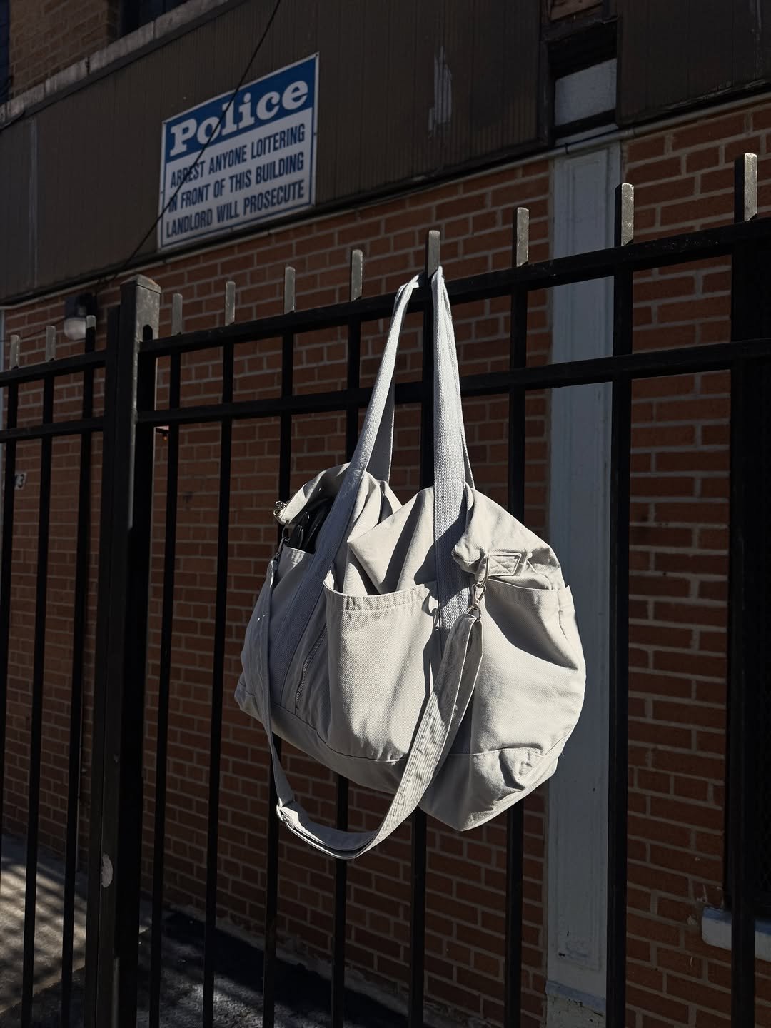 Photo by AAOA on April 05, 2026. May be an image of grocery bag, brick wall and text.