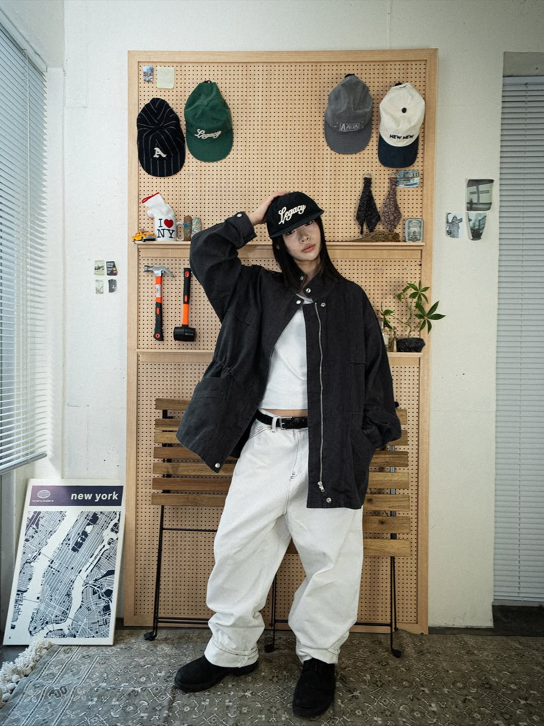 Photo by AAOA on November 12, 2025. May be an image of hat, duffle coat, beret, parka, sweatpants, face mask and text.