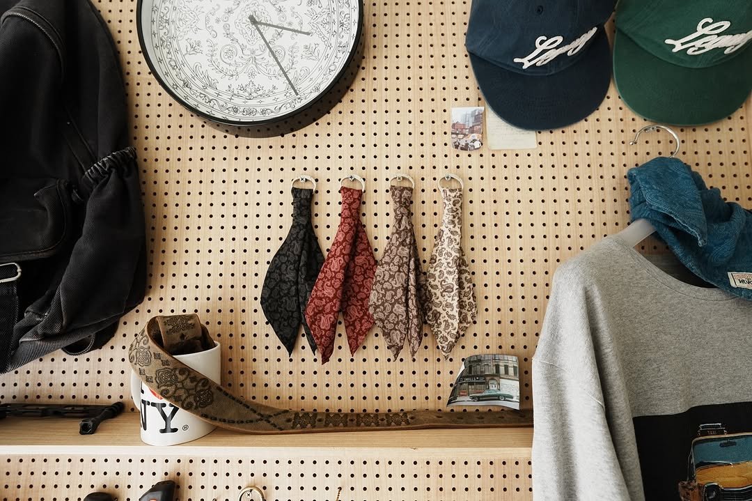 Photo by AAOA on June 28, 2025. May be an image of hat, coat rack, rack, pegboard and hat shop.