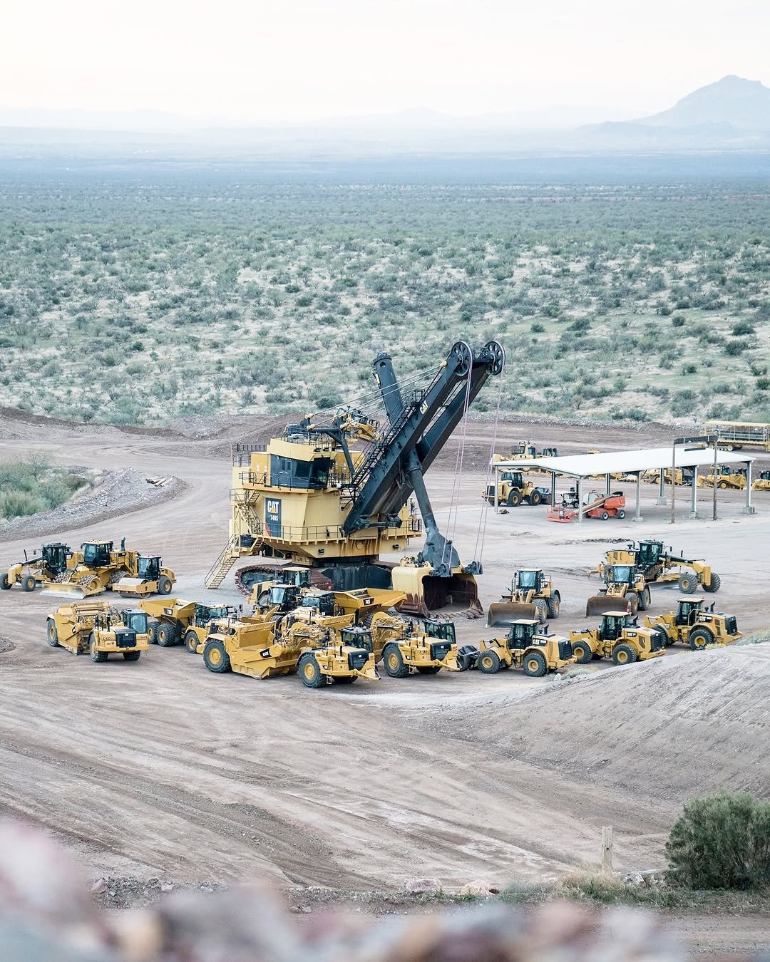 Photo by Aaron Witt on September 30, 2025. May be an image of crane, scraper and text.