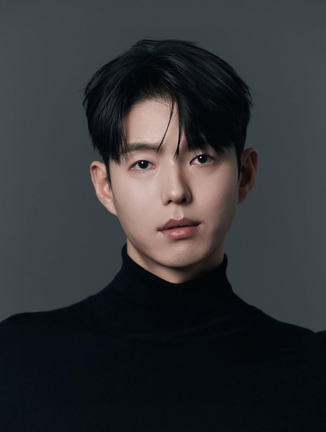 Photo by 하준   Ha_Jun on February 24, 2026. May be an image of one or more people, hair, makeup, turtleneck and text.