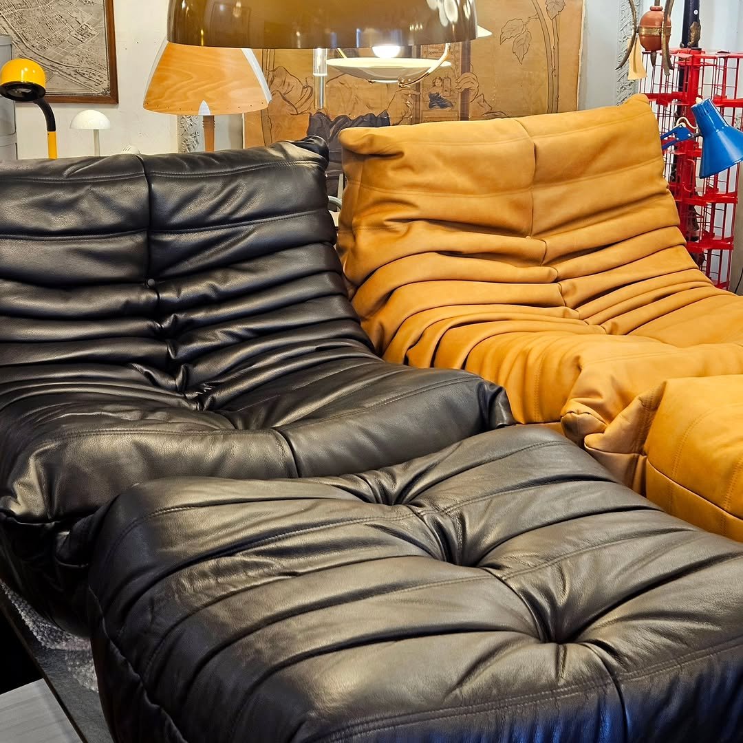 Photo by adel on December 25, 2025. May be an image of leather, recliner, armchair, sofa, ottoman, chaise lounge, living room and text.