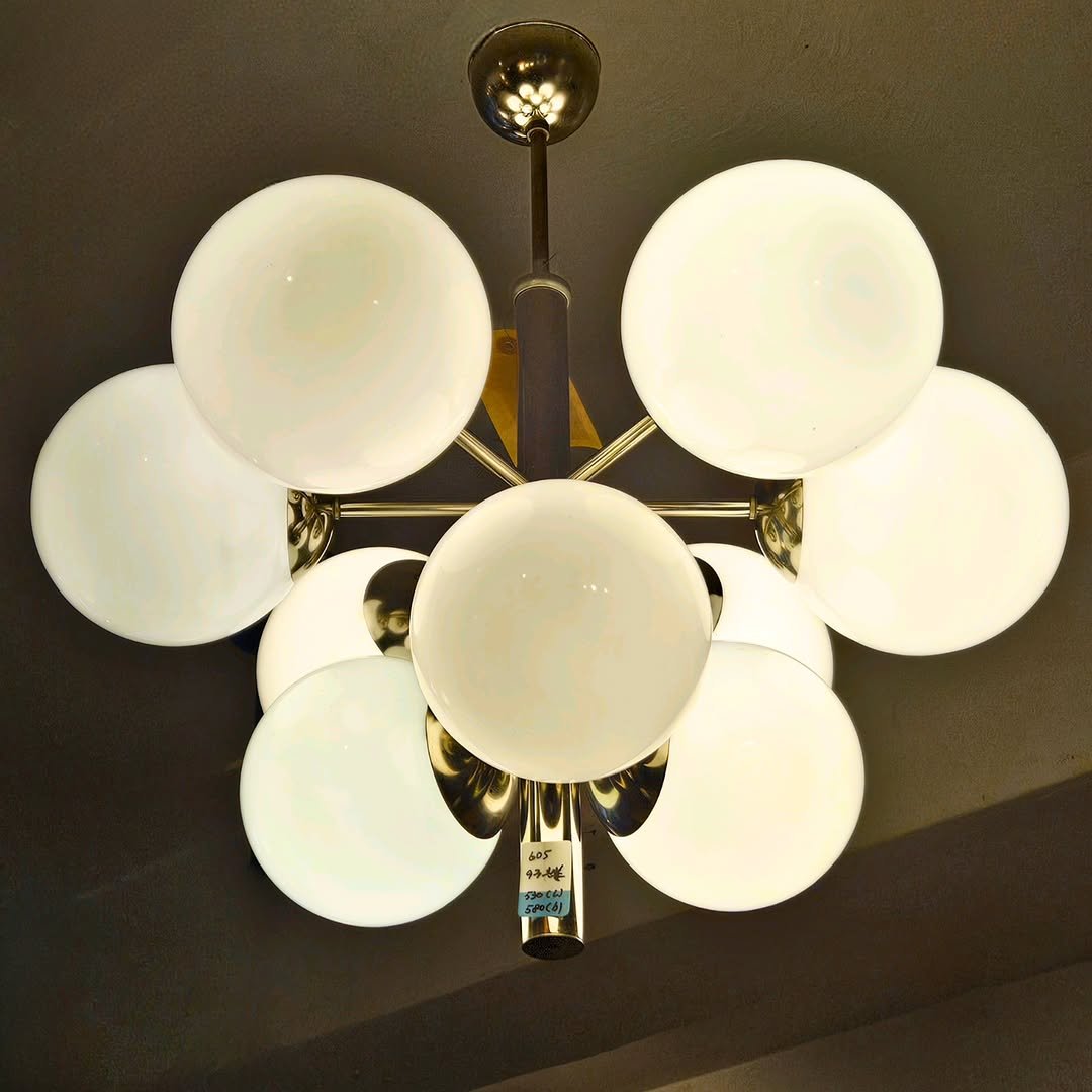 Photo by adel on December 14, 2025. May be an image of lighting, candle holder, chandelier, lamp, lightbulb, lamp shade and text.