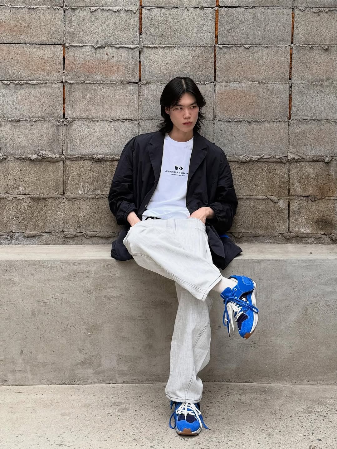 Photo by ADERERROR SPACE on June 30, 2025. May be an image of wingtip shoes, sweatpants, outerwear, sneakers and sportswear.