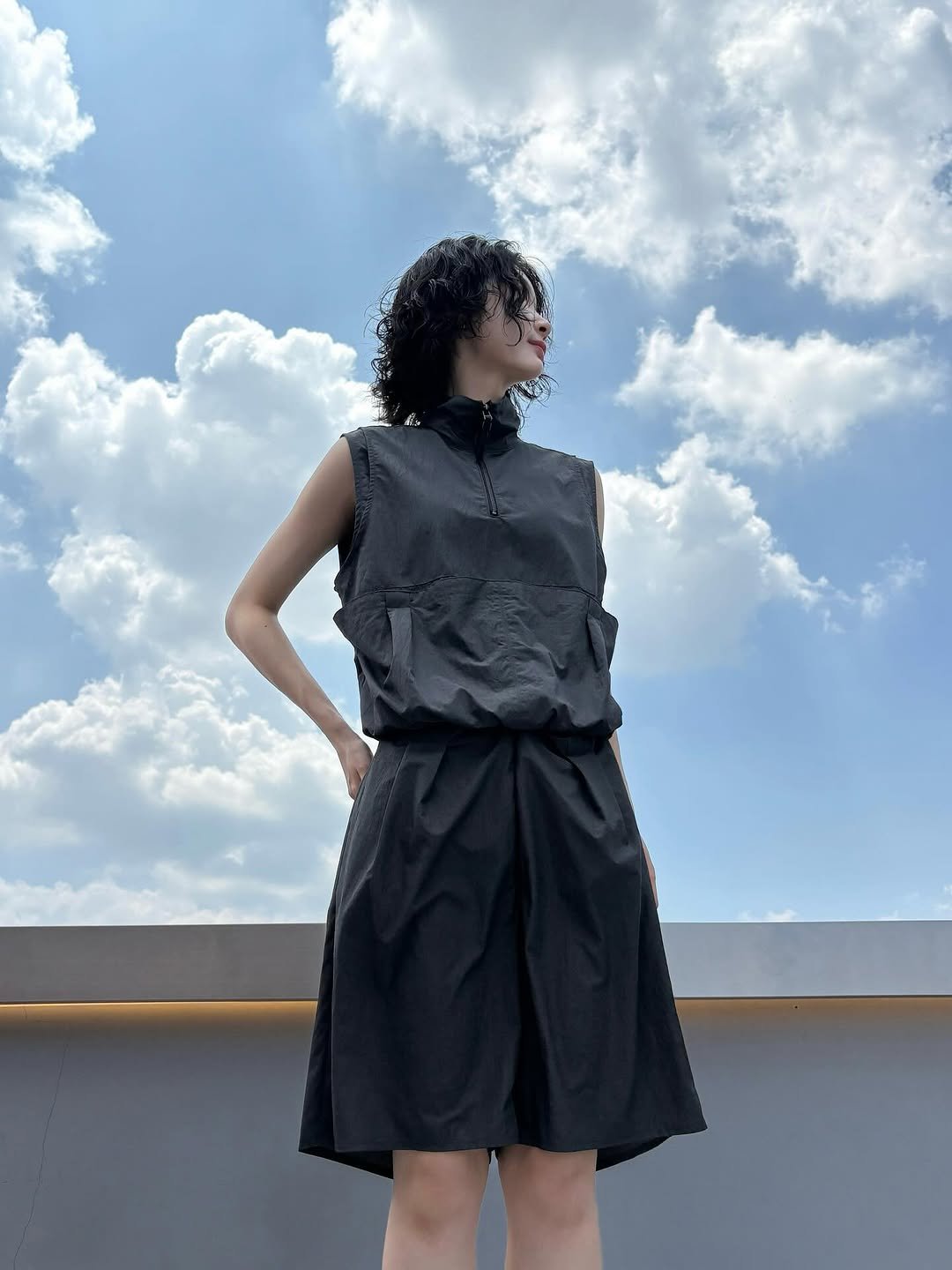 Photo by ADERERROR SPACE on July 22, 2025. May be an image of 1 person, vest and text.