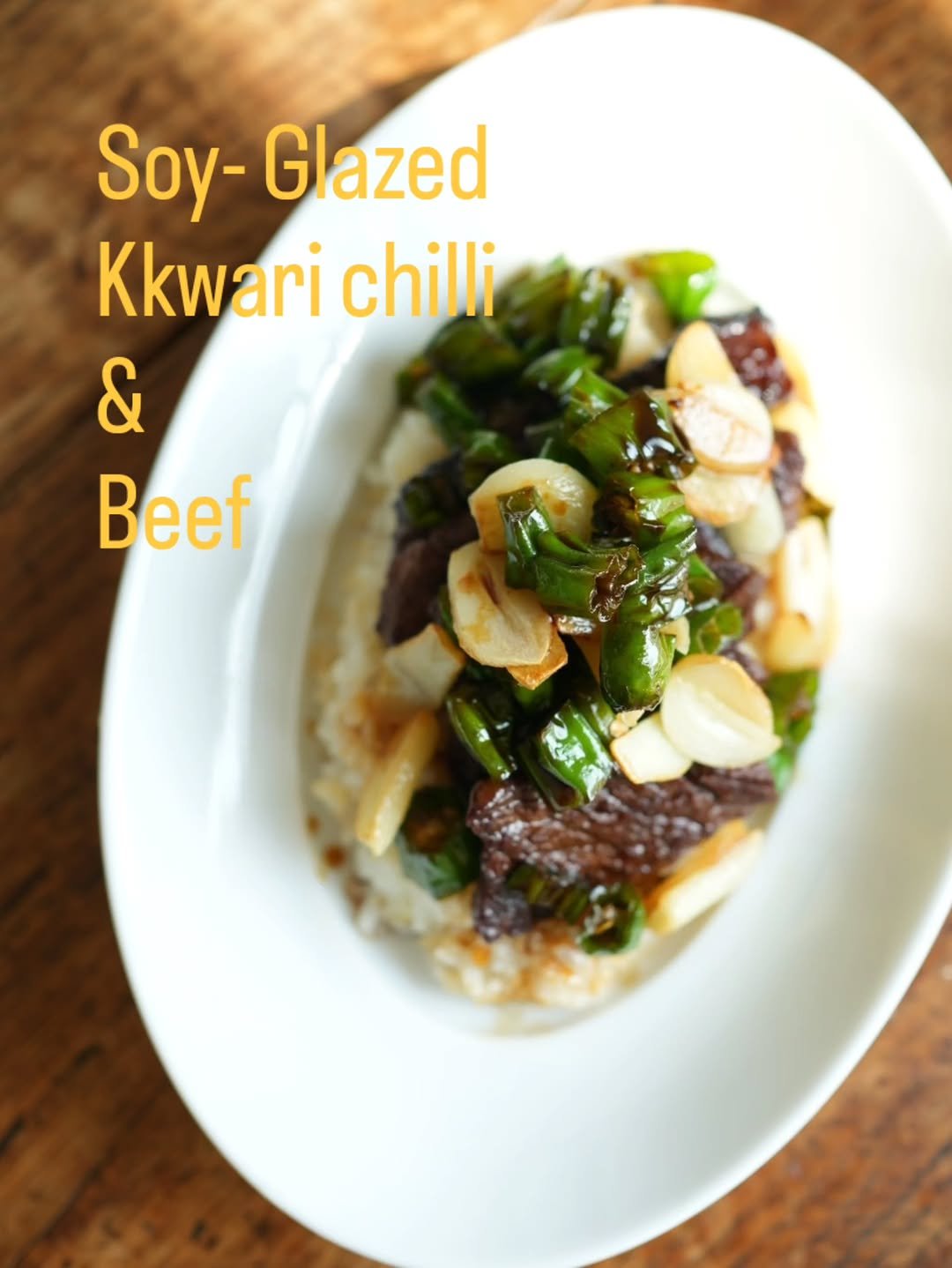 Photo by 아들쉪 on March 12, 2026. May be an image of congee, shiitake mushrooms, steak, soy sauce, grits, rice and text that says 'Soy- Soy-Glazed Glazed Kkwari chilli & Beef'.