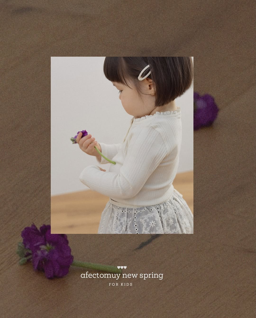 Photo by 아펙토무이 on February 10, 2026. May be an image of child, dress, flower and text that says 'afectomuynewspring afectomuynewspring afectomuy new spring v M FOR KIDS'.