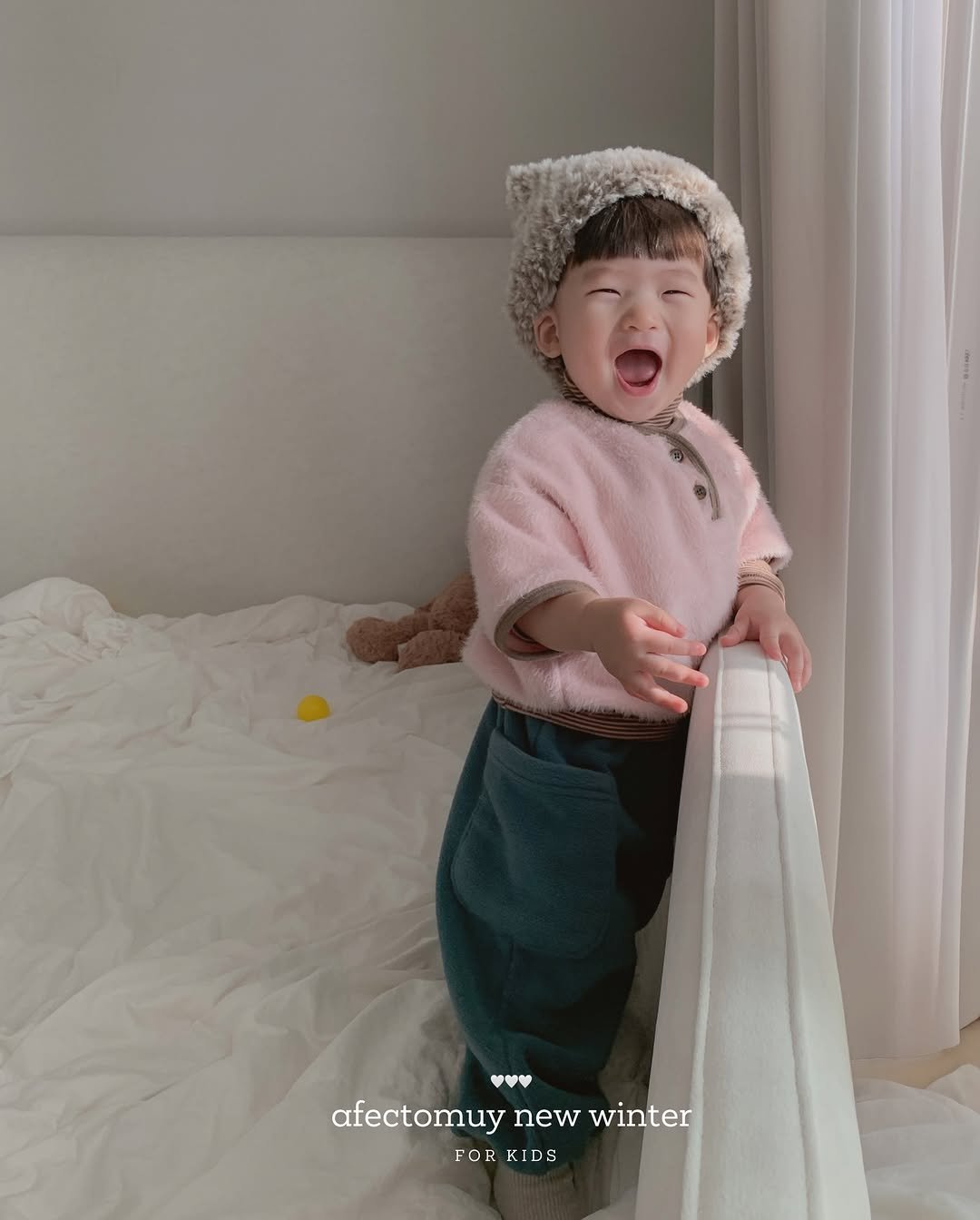 Photo by 아펙토무이 on December 03, 2025. May be an image of baby, duffle coat, hat and text that says 'afectomuy afectomuynewwinter new winter FOR KIDS K'.