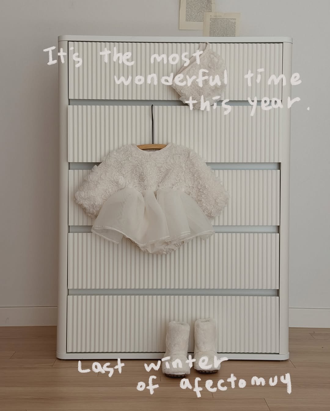Photo by 아펙토무이 on December 17, 2025. May be an image of child, armoire, rack, baby bed, clothes hanger and text that says 'MOST wonderful time thi thisye isyear 4 Last winter of afectomuy'.