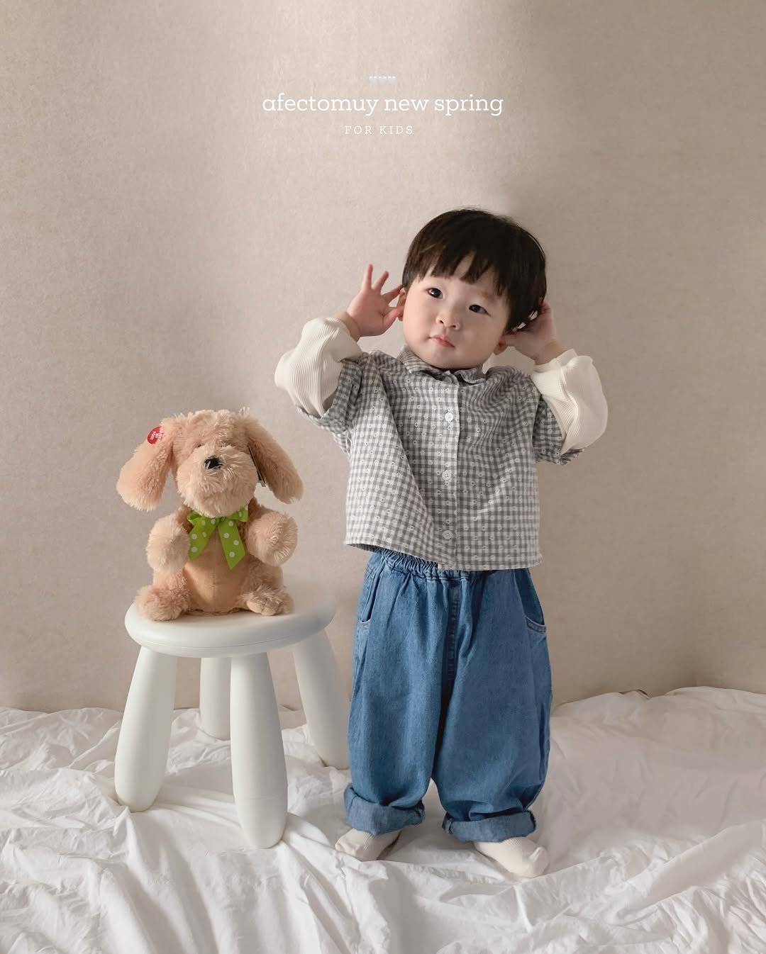 Photo by 아펙토무이 on February 16, 2026. May be an image of baby, duffle coat and text that says 'afectomuy afectomuynewspring new spring PORKIDS FOR KIDS'.