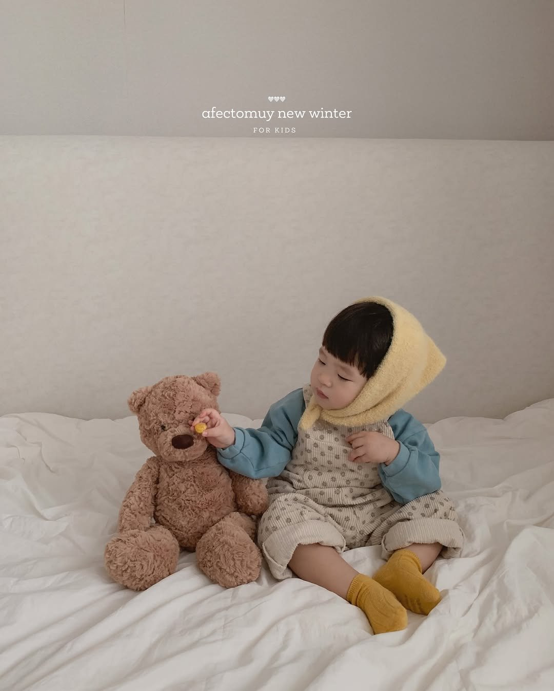 Photo by 아펙토무이 on December 02, 2025. May be an image of baby, duffle coat and text that says 'afectomuy afectomuynewwinter new winter FOR afectouynewwinter OR KIDS'.