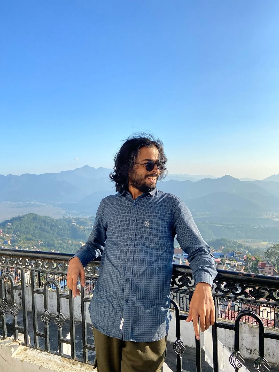 Photo by देवेन्द्र पटेल in Nepal. May be an image of one or more people, beard, mountain, horizon and text.