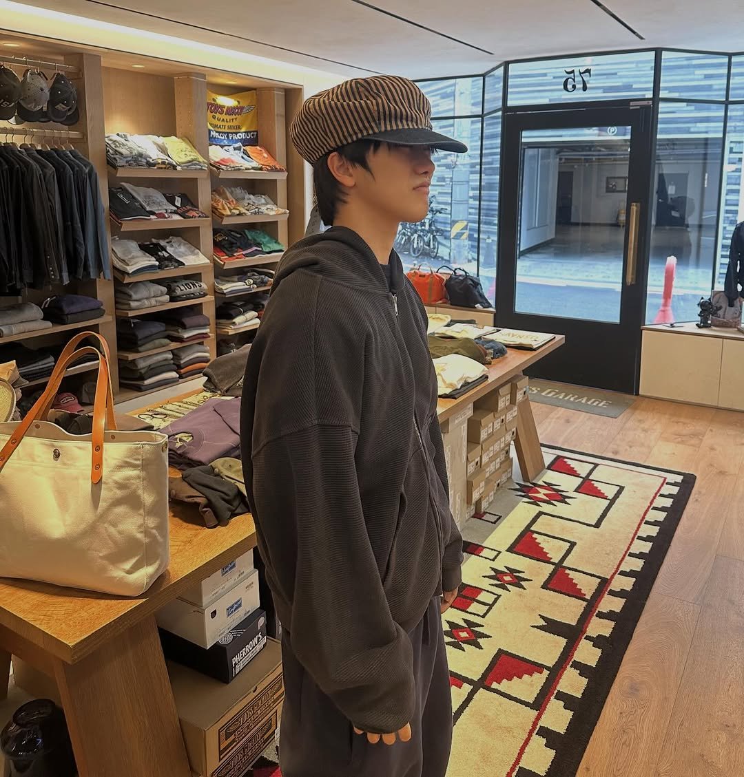 Photo by 안지호 on April 14, 2026. May be an image of duffle coat, hat, hat shop and text.