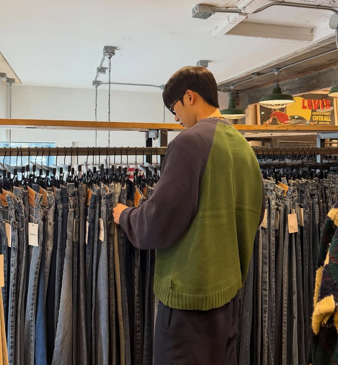 Photo by 안지호 on December 11, 2025. May be an image of duffle coat, rack and clothes hanger.