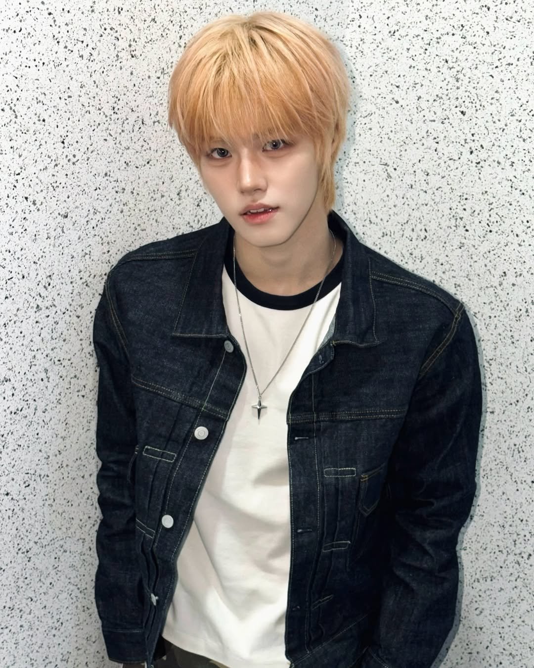 Photo by AHOF 아홉 on March 24, 2026. May be an image of bolo tie and text.