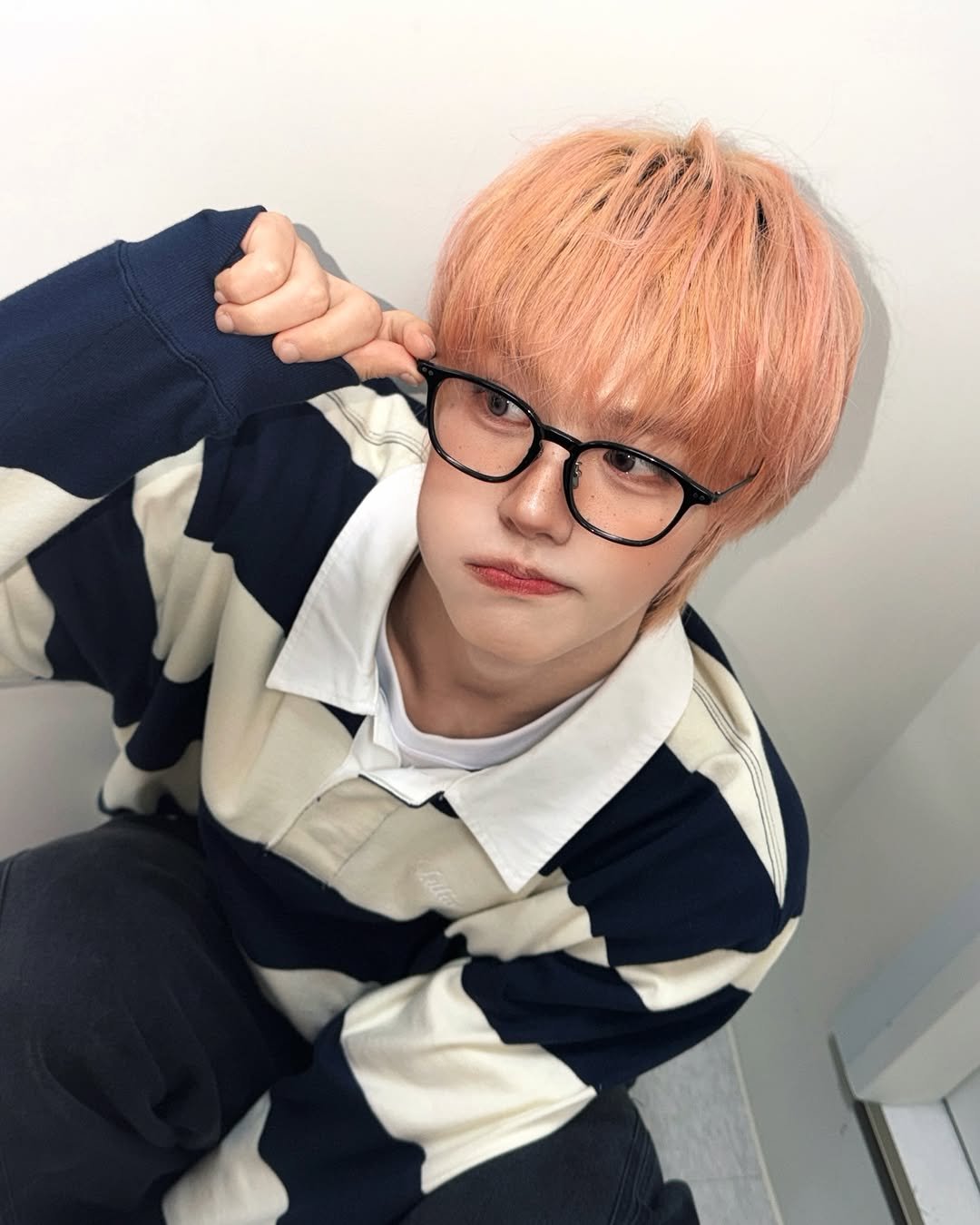 Photo by AHOF 아홉 on March 15, 2026. May be an image of one or more people, bangs and text.