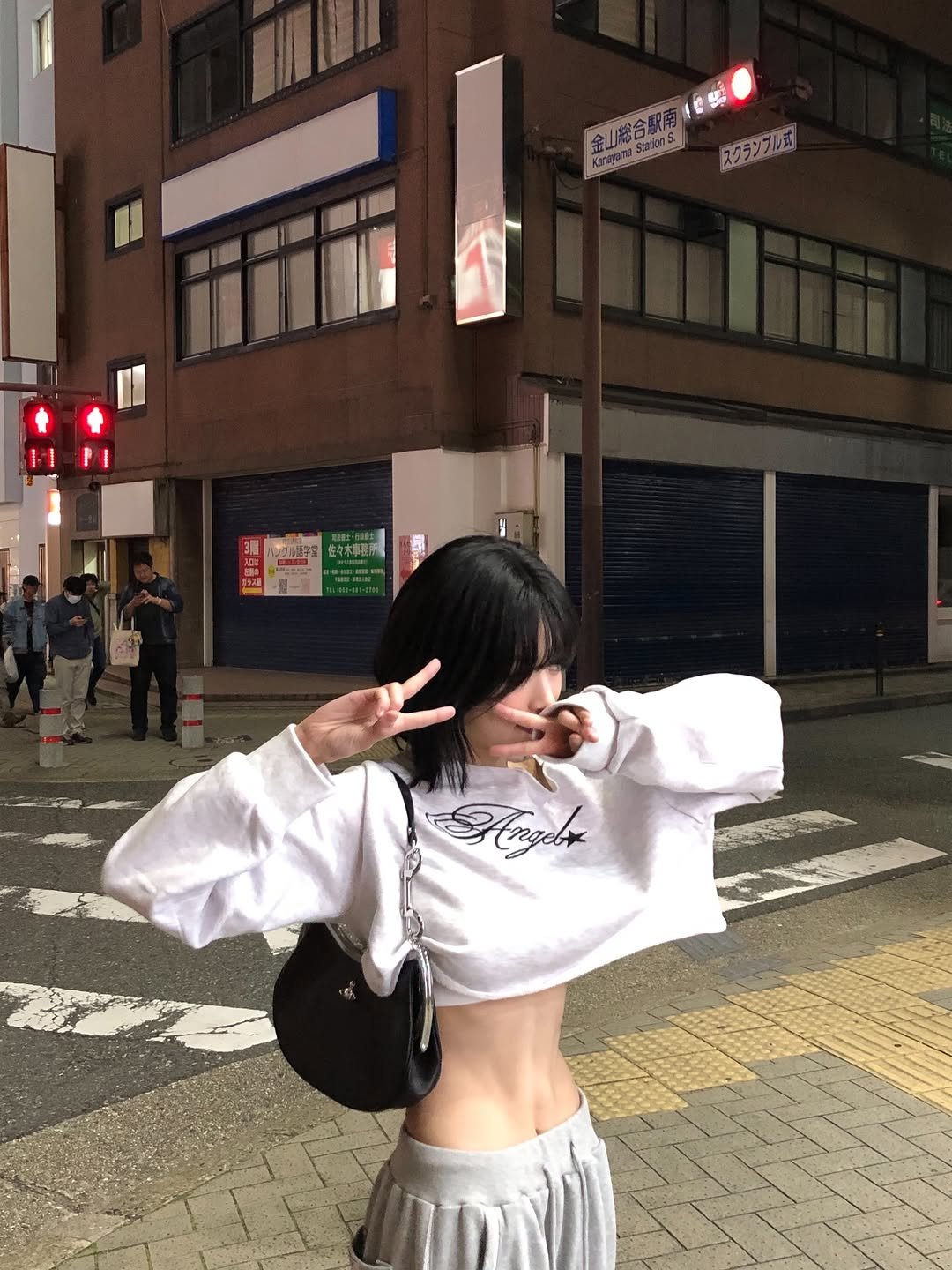 Photo by JUNG AHYEON on December 02, 2025. May be an image of miniskirt, street and text.