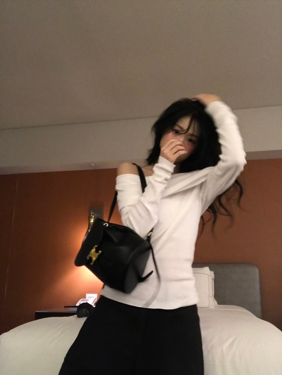 Photo by JUNG AHYEON on November 20, 2025. May be an image of sweatpants, turtleneck and text.