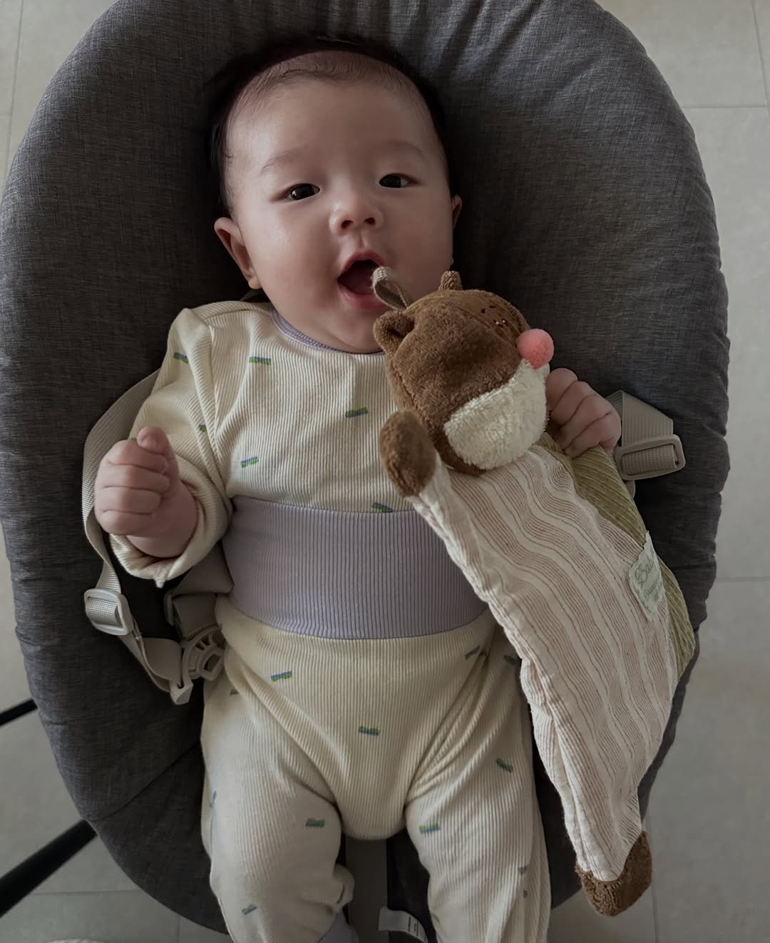 Photo shared by 청라 최수종 on December 01, 2025 tagging @apricotstudios_. May be an image of baby, diaper, blanket, baby bed and text.