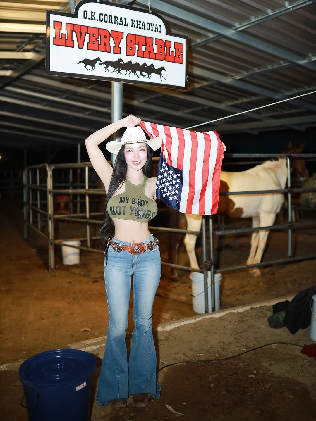 Photo by ไอเนะ ยูคิมุระ on February 07, 2026. May be an image of horse, belt buckle, flag and text.