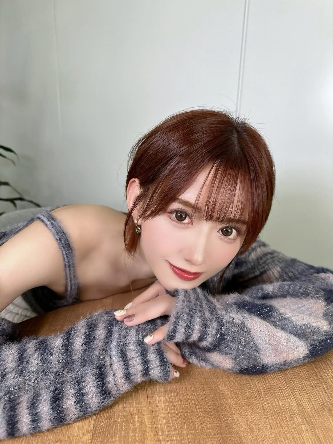 Photo by 希島あいり / Airi Kijima 💐:*. on April 23, 2026. May be an image of one or more people, hair, turtleneck, top and text.