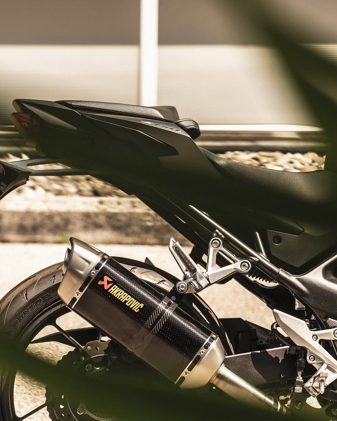 Photo by Akrapovič Exhaust System on December 10, 2025. May be an image of racing vehicles, motorcycle, scooter, helmet and text.