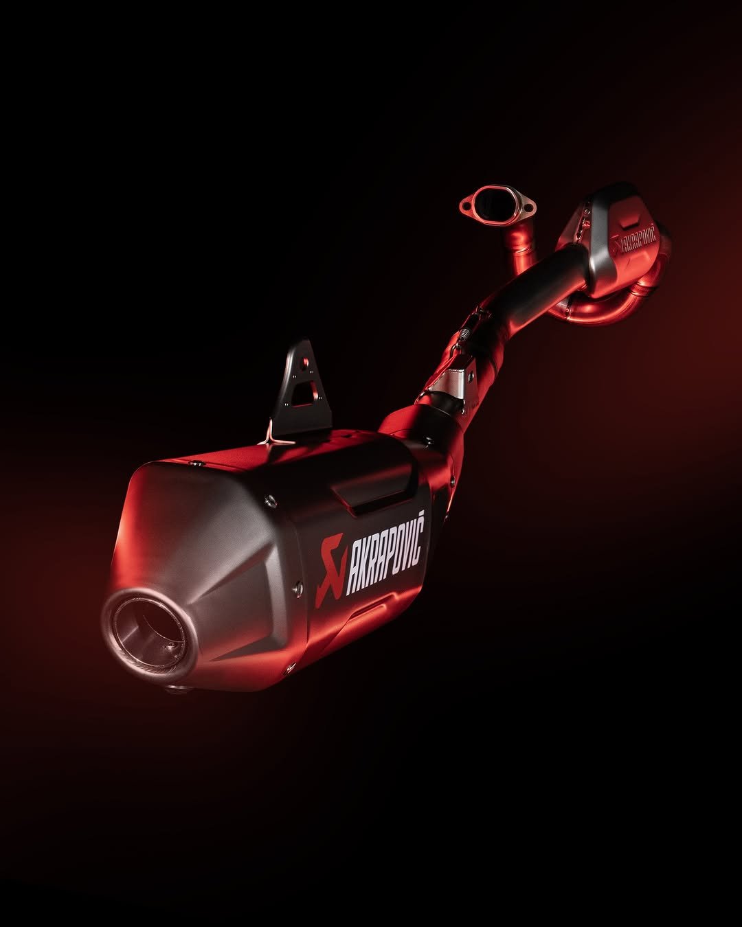 Photo by Akrapovič Exhaust System on April 28, 2026. May be an image of speaker, hair dryer, flashlight, videogame controller and text.