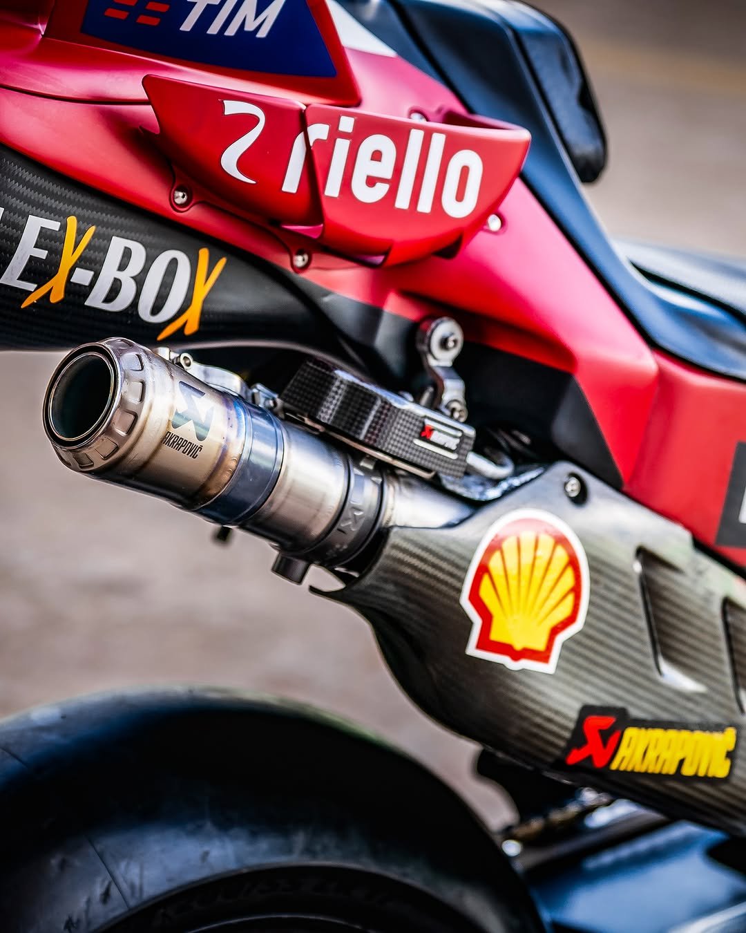 Photo shared by Akrapovič Exhaust System on April 24, 2026 tagging @ducaticorse. May be an image of racing vehicles, motorcycle, helmet and text.