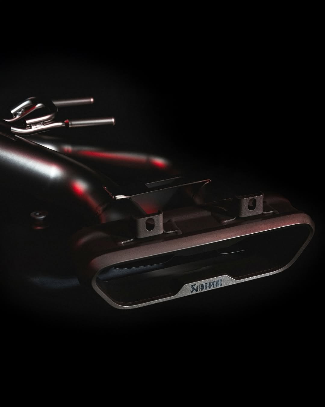 Photo by Akrapovič Exhaust System on December 16, 2025. May be an image of videogame controller, stapler, projector and text.