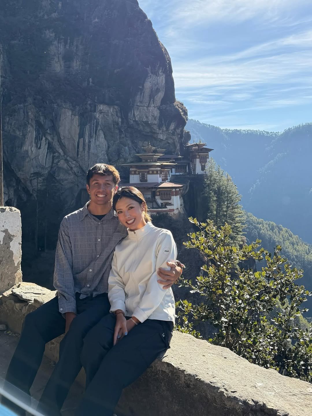 Photo shared by Alex Albon on December 30, 2025 tagging @lilymhe. May be an image of mountain and text.