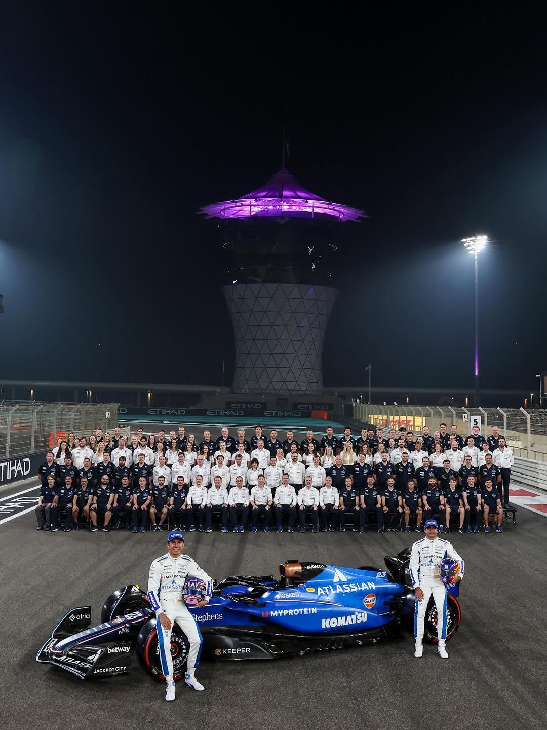 Photo shared by Atlassian Williams F1 Team on December 06, 2025 tagging @carlossainz55, @alex_albon, and @jv.f1. May be an image of stadium and text.