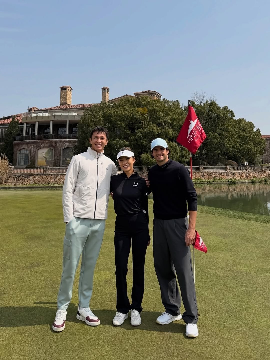 Photo shared by Alex Albon on March 16, 2026 tagging @carlossainz55, and @lilymhe. May be an image of golf, golf club, golf course and text.