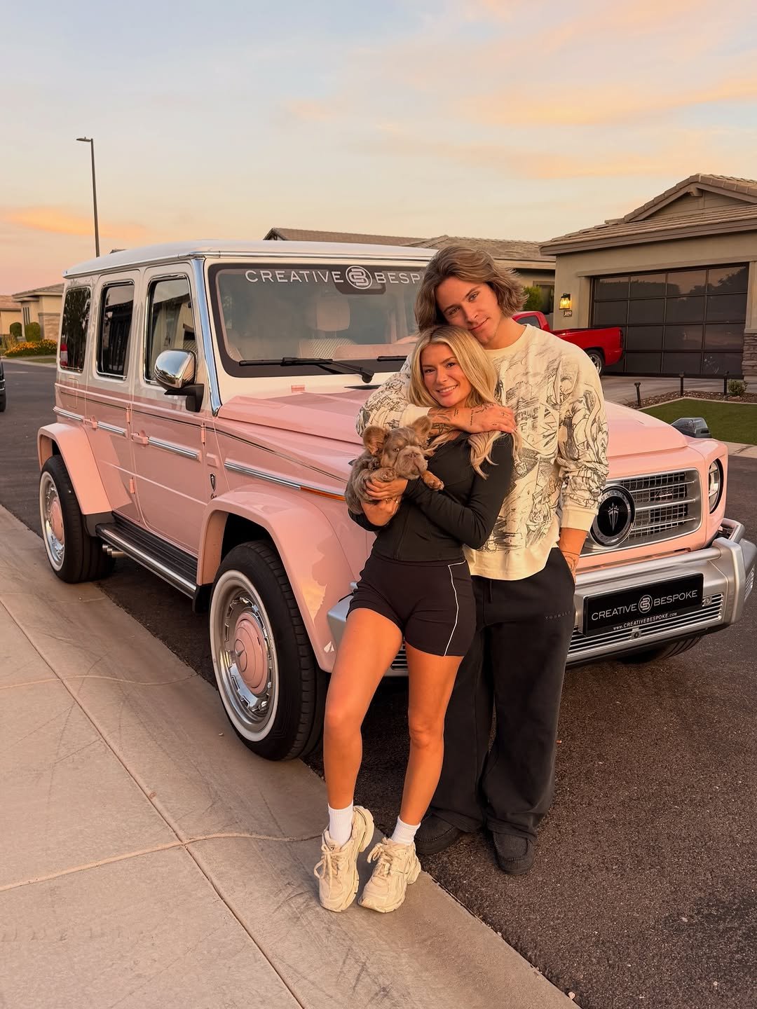 Photo shared by Alex Eubank on February 14, 2026 tagging @shelby.sapp. May be an image of people kissing, car, wheel, minivan, limousine and text.