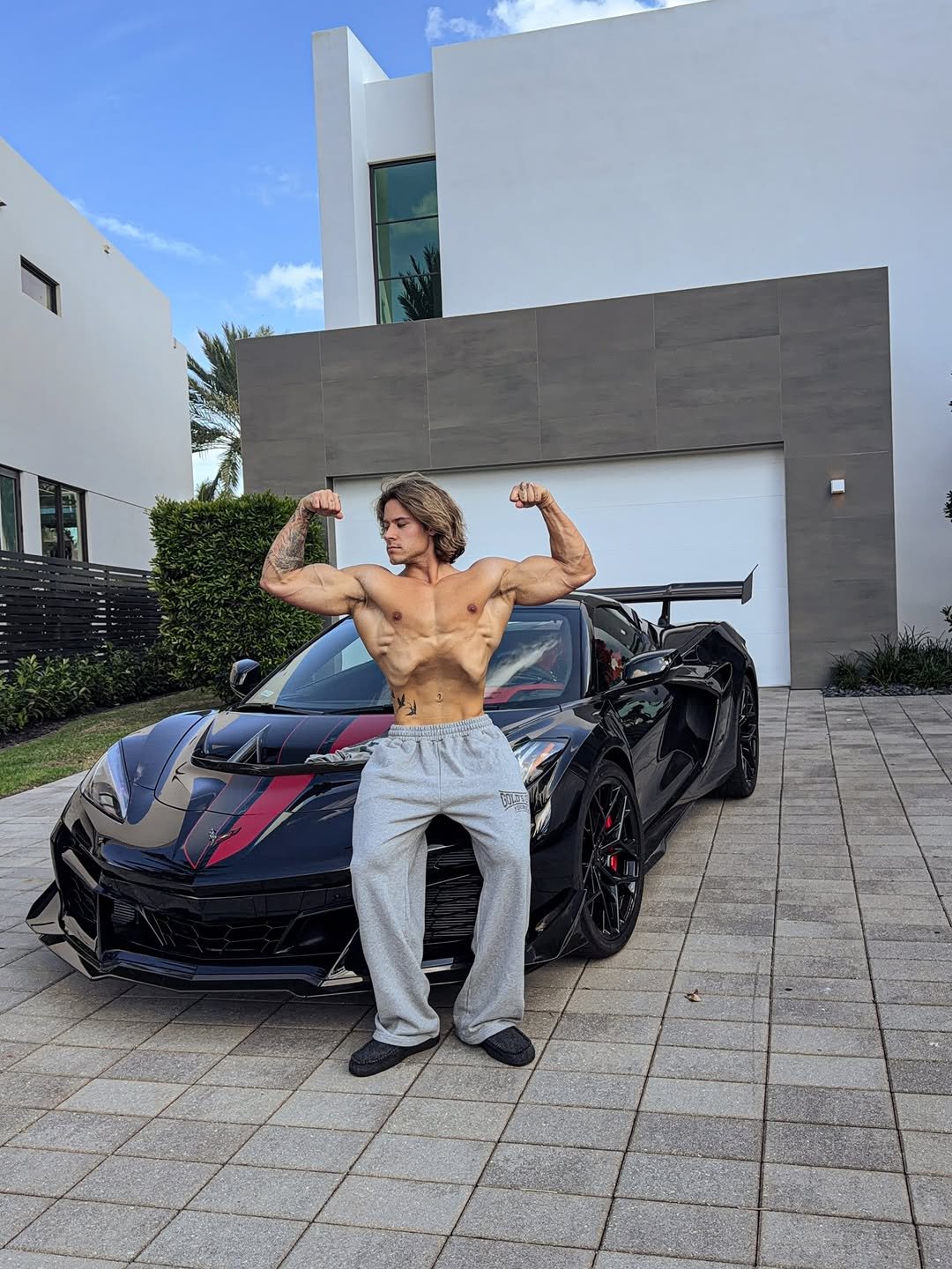 Photo by Alex Eubank on December 19, 2025. May be an image of one or more people, biceps, people bodybuilding and text.