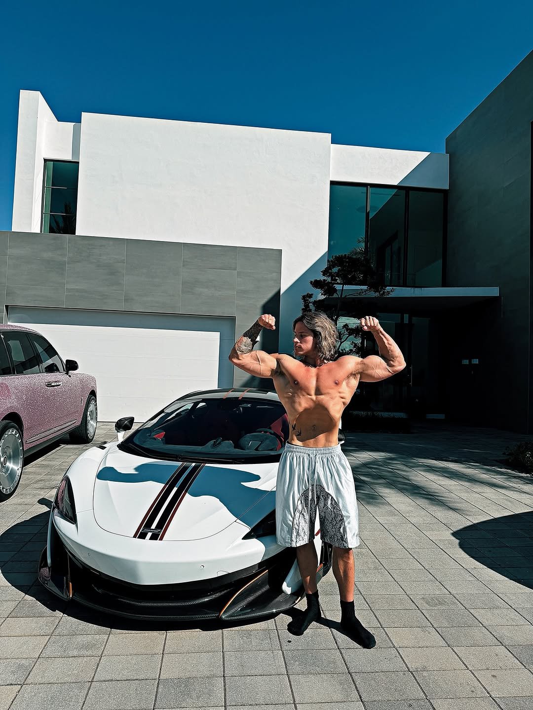 Photo by Alex Eubank on February 27, 2026. May be an image of one or more people, biceps and text.