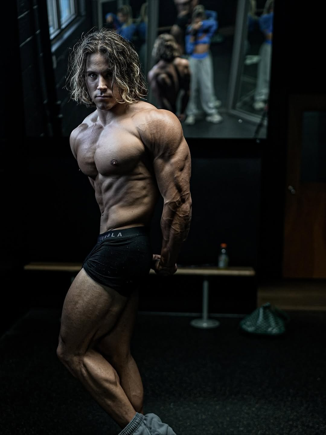 Photo by Alex Eubank on November 10, 2025. May be an image of one or more people, biceps, people bodybuilding and text.