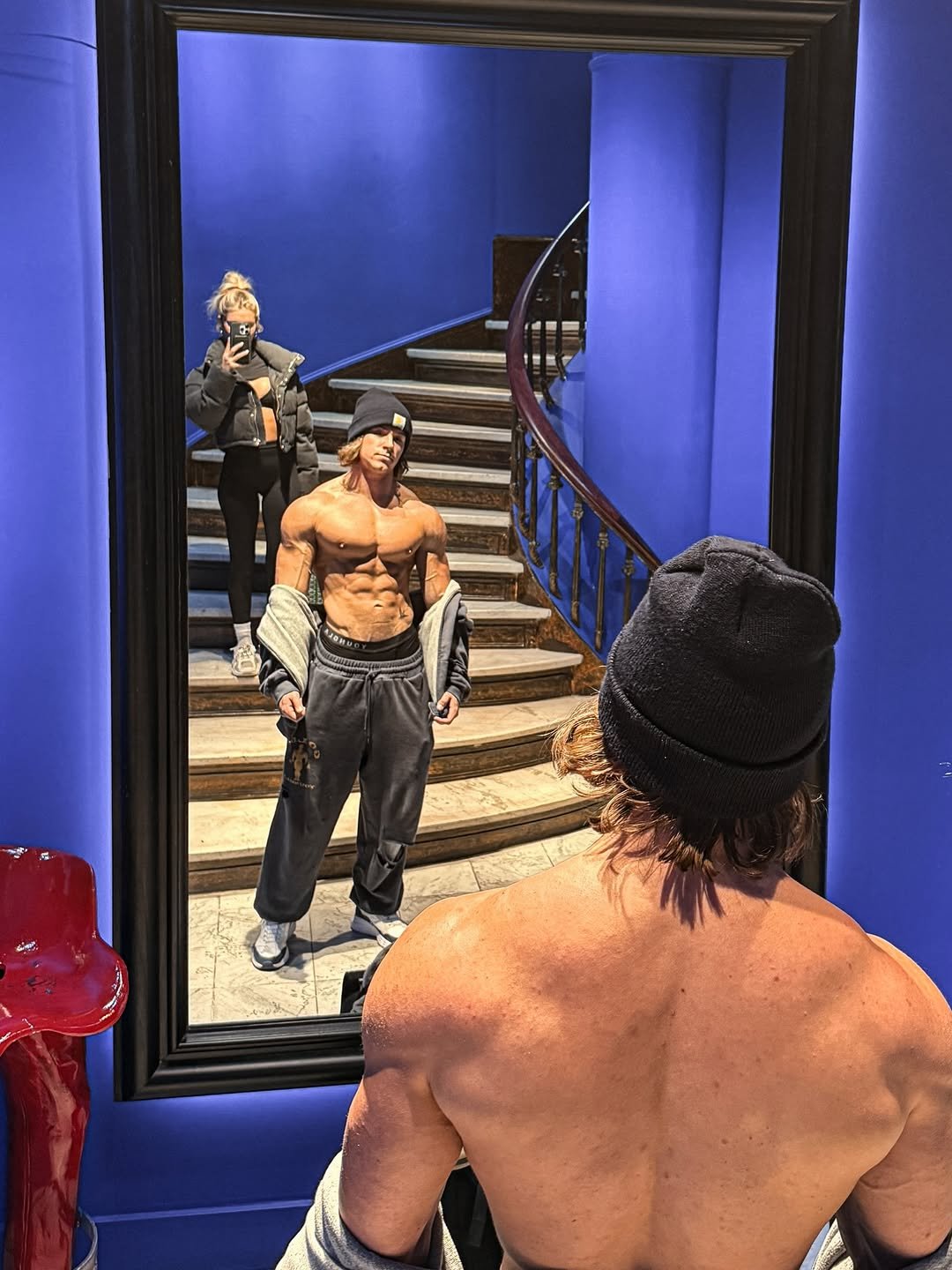 Photo by Alex Eubank on December 26, 2025. May be an image of one or more people, biceps, people bodybuilding, mirror and text.