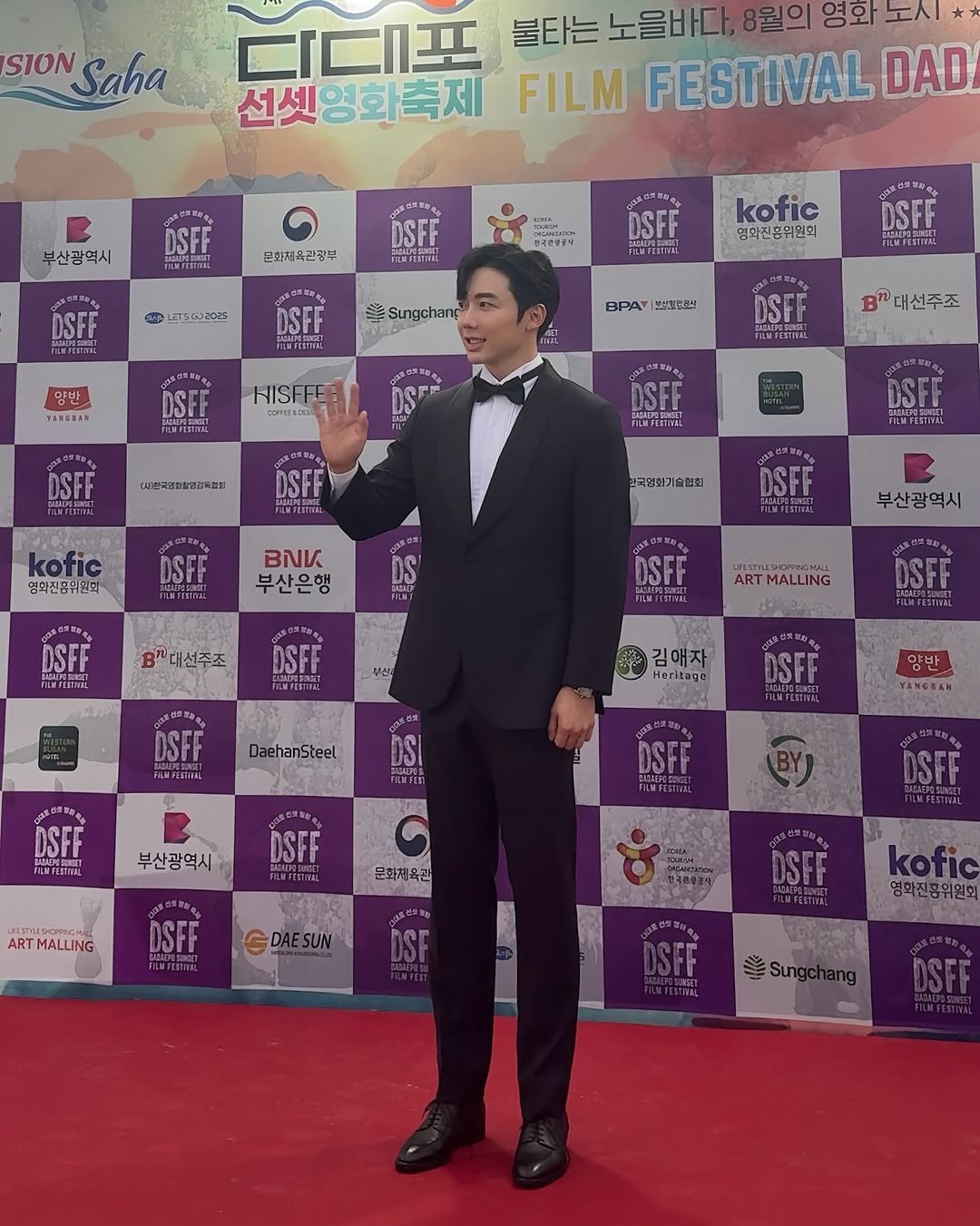 Photo shared by Jihoon Kim on August 12, 2025 tagging @ribertailor, @bava_clinic, and @bava_body_lounge. May be an image of 1 person, dinner jacket, poster, carpet and text.