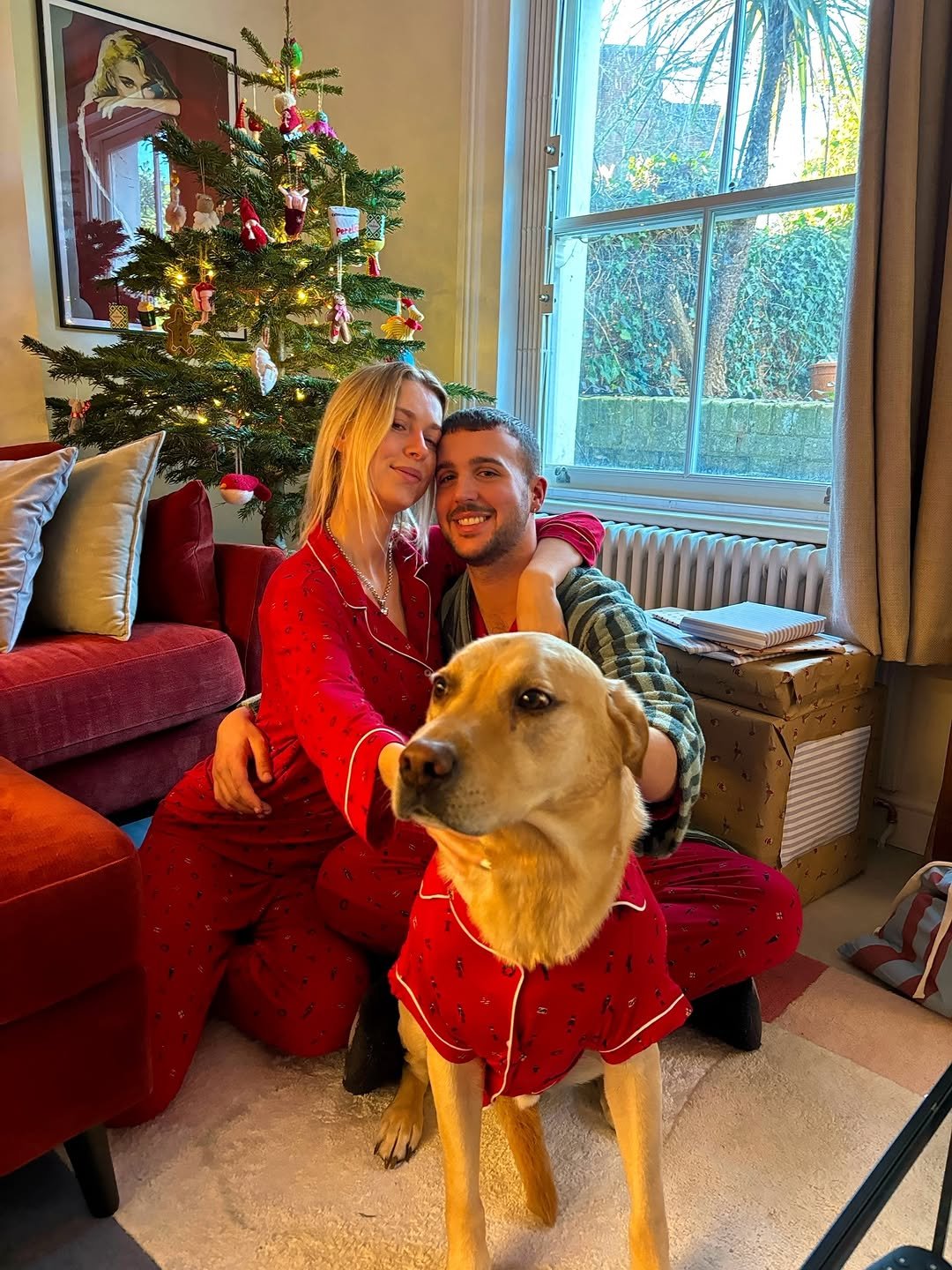 Photo shared by ALFIE STEINER on December 26, 2025 tagging @eberjey, and @angelicamaxwell. May be an image of golden retriever, christmas tree and text.