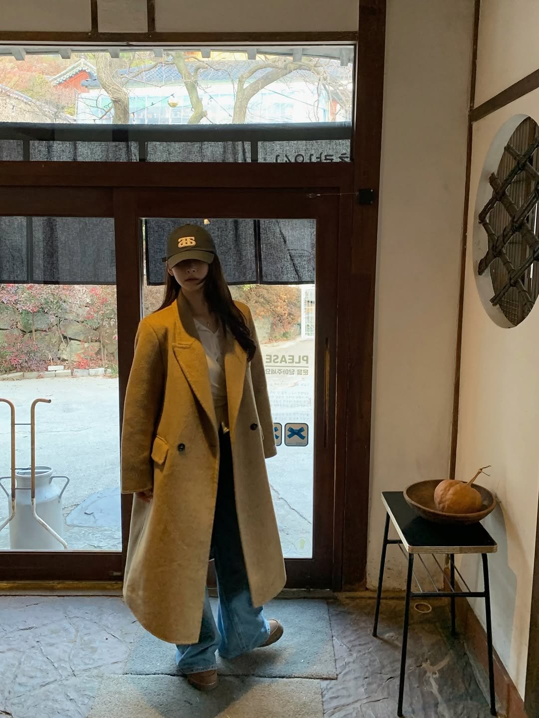 Photo by 예진 Yejin on March 17, 2026. May be an image of duffle coat, overcoat, hat, bowler hat, beret, cornflower, hat shop and text.