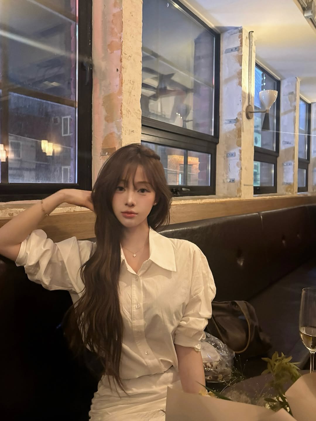 Photo by 다영 ALLZEROK on December 29, 2025. May be an image of one or more people, hair, top, white lily and text.