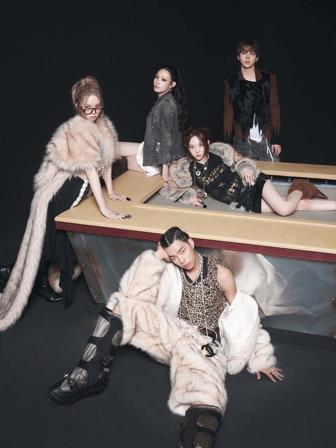 Photo shared by ALLDAY PROJECT on December 02, 2025 tagging @baileysok, @tarzzan, @jowoochan_santa, @anniesymoon, and @youngseo. May be an image of one or more people, makeup, fur coat, overcoat, magazine and text.