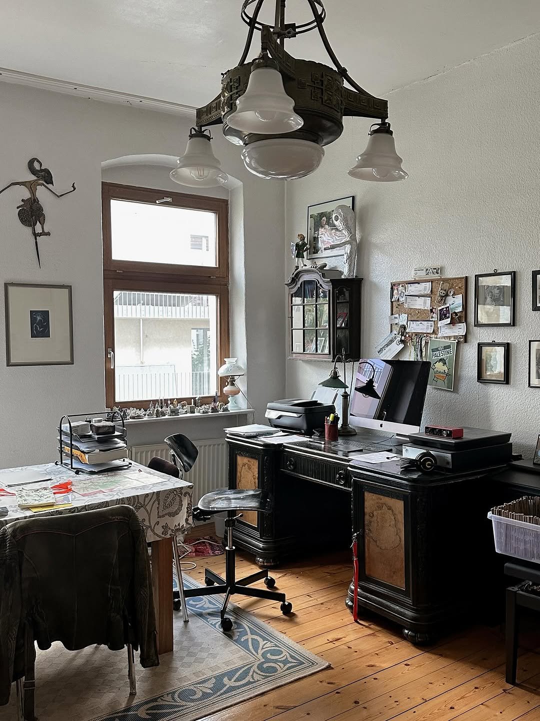 Photo by 융 Ashley on July 30, 2025. May be an image of chandelier, desk, sewing machine, indoors, office and text.