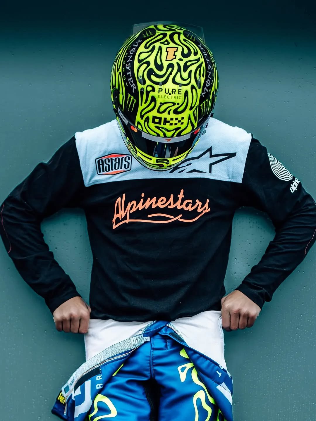 Photo shared by Alpinestars on February 16, 2026 tagging @lando, and @lnfour. May be an image of ‎racing vehicles, dirt bike, glasses, face mask, helmet and ‎text that says '‎إنا PURE LECTRIC AStars Apinestary ABe 円‎'‎‎.