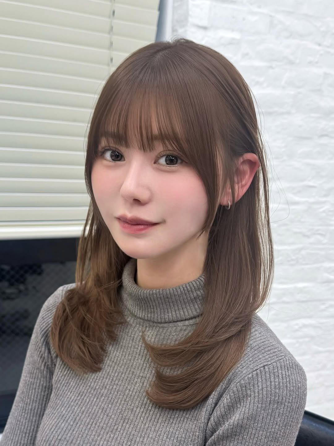 Photo by 顔周りカット/前髪/レイヤーカット/表参道/高島大登 on February 21, 2026. May be an image of one or more people, braids, bangs, turtleneck and text.