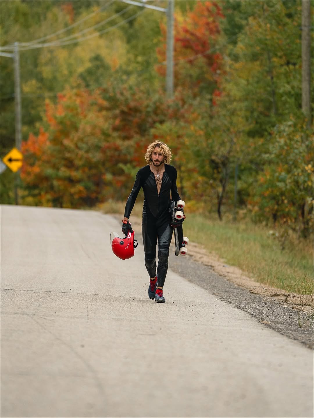 Photo by Ambroise Trt on November 01, 2025. May be an image of skateboard, helmet, glasses, scarecrow, road and text.