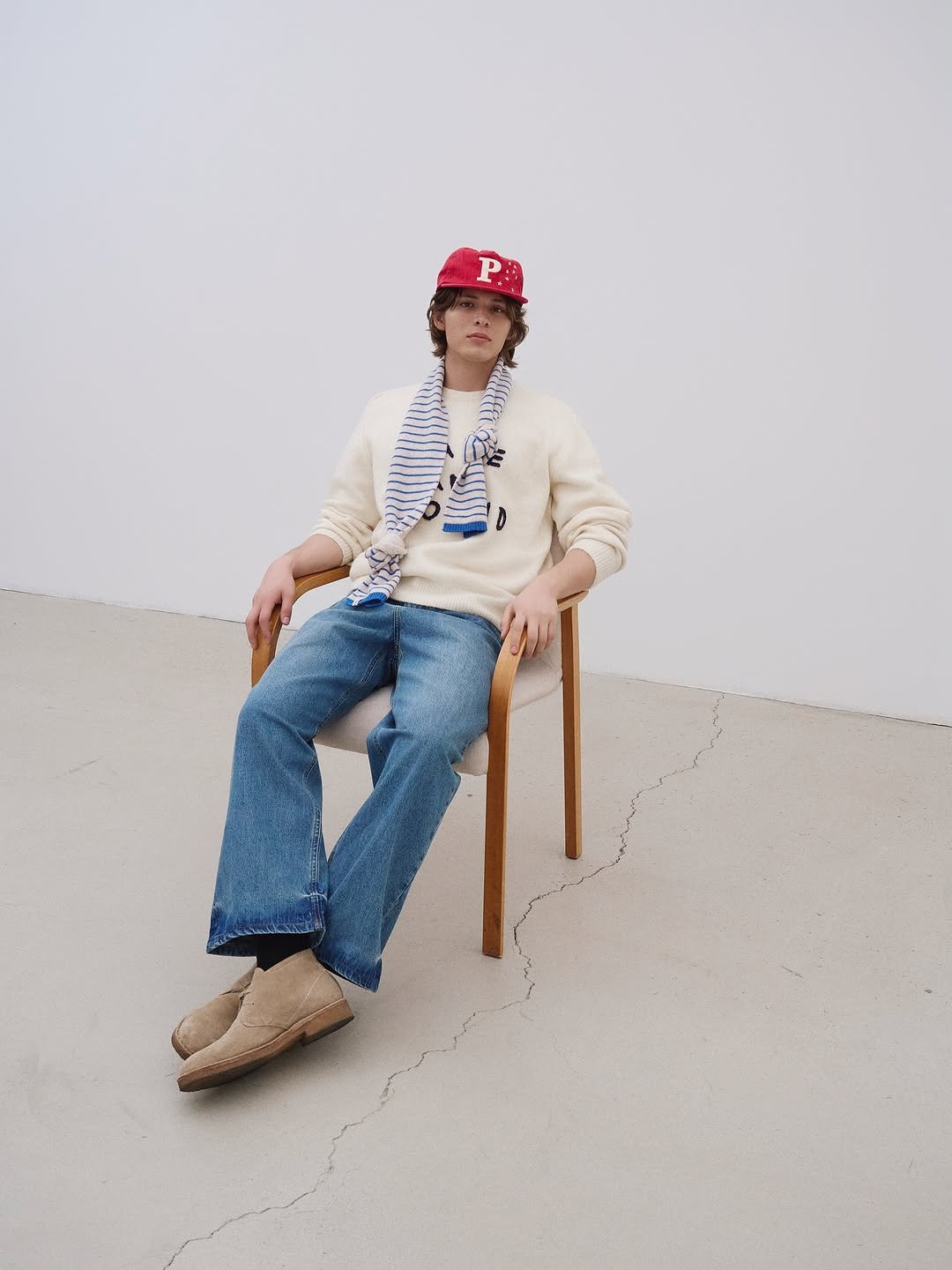 Photo by AMOUPRE 아모프레 on October 29, 2025. May be an image of turtleneck, bolo tie and text.