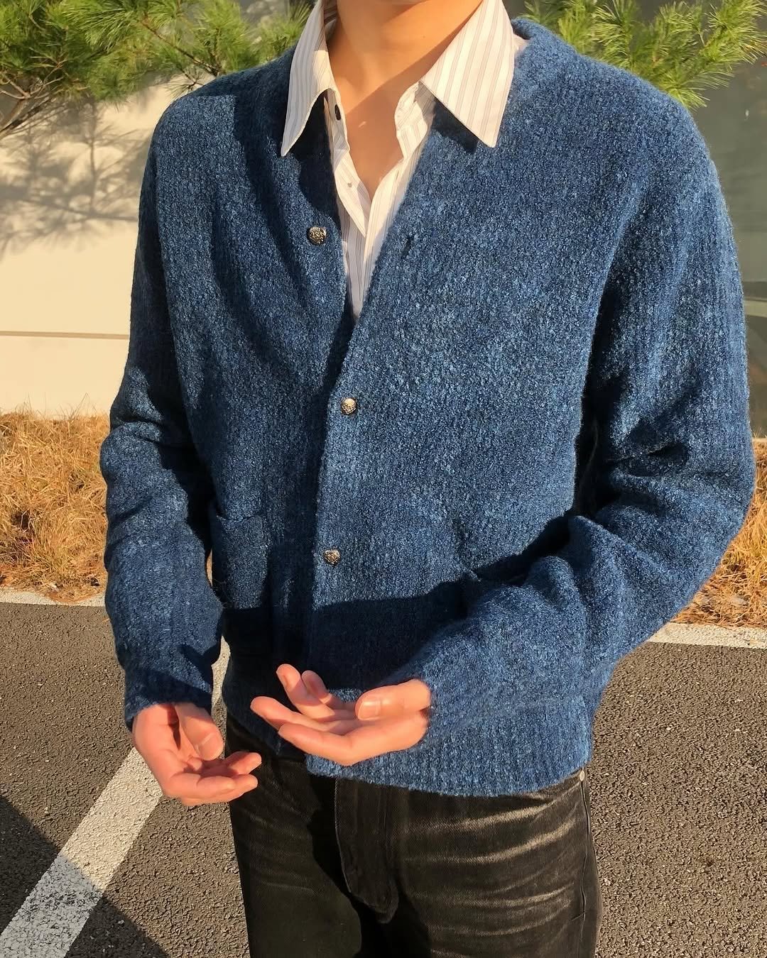 Photo by AMOUPRE 아모프레 on December 05, 2025. May be an image of cardigan, turtleneck, sweater and text.