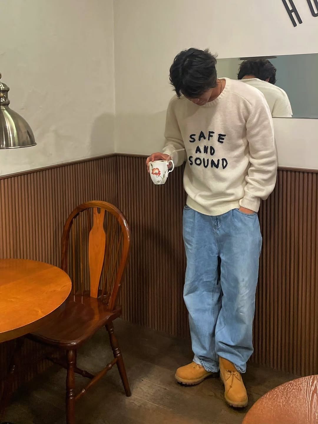 Photo by AMOUPRE 아모프레 on October 24, 2025. May be an image of standing, fleece, cornflower and text that says 'SAFE E AND SOUND'.