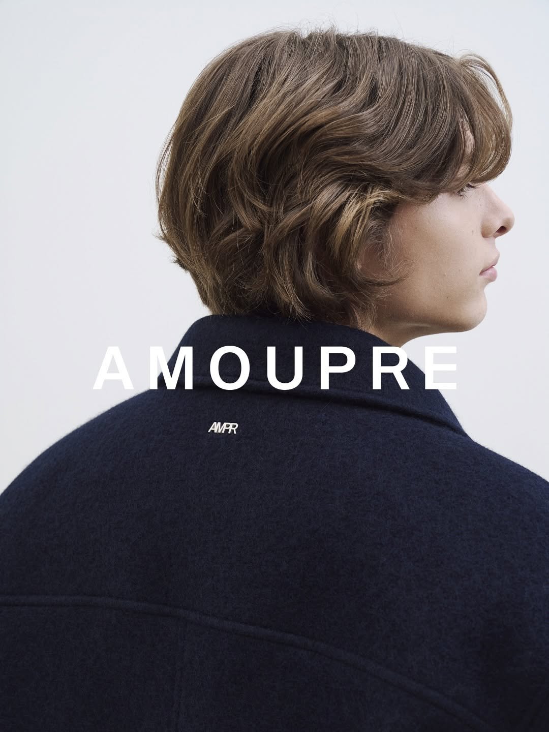Photo by AMOUPRE 아모프레 on October 15, 2025. May be an image of duffle coat, top, magazine, poster and text that says 'A AMOUPRE RE M AVFR AMPR'.
